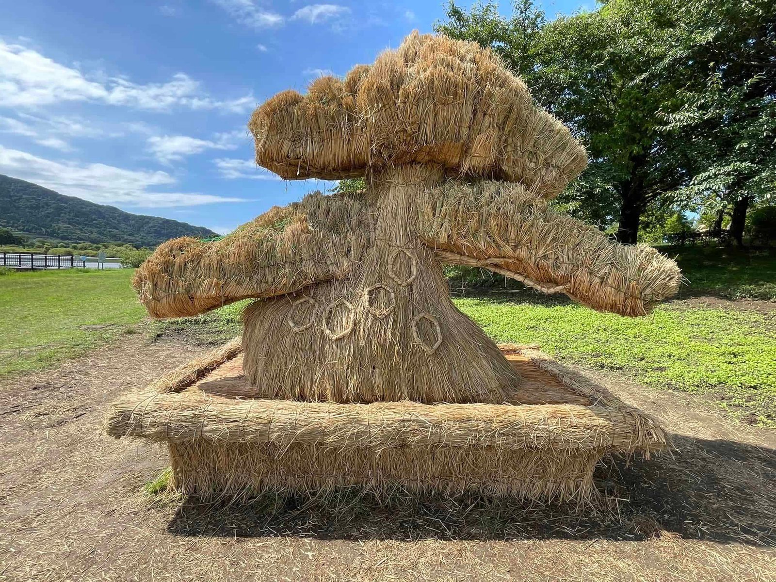 a mammoth tree sculpture made of straw