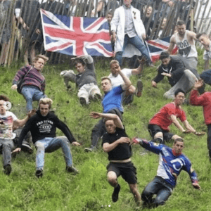 Thrilling Slow Motion Footage of the 2024 Coopers Hill Cheese Rolling and Wake